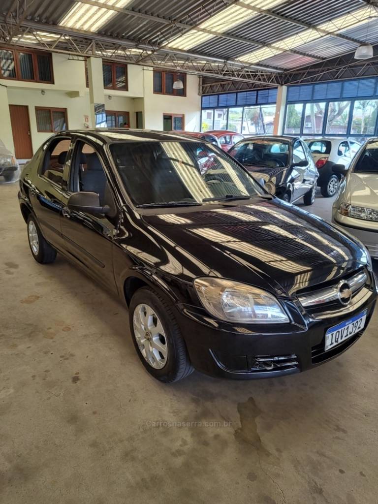 CHEVROLET - PRISMA - 2010/2011 - Preta - R$ 31.000,00